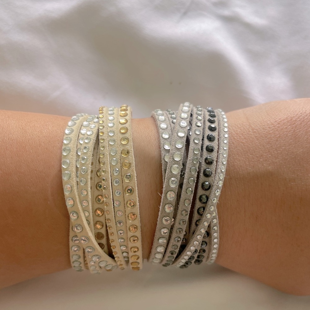 Like new. Knock off Swarovski leather crystal bracelets.